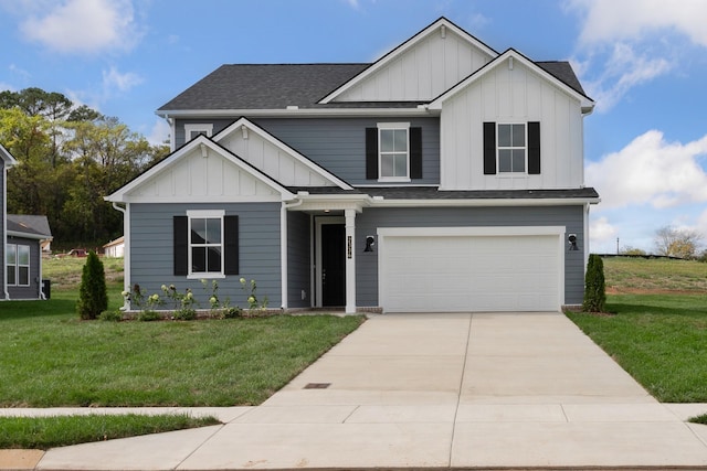 view of front of home featuring a garage and a front lawn