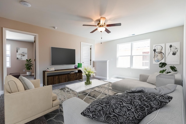 living room featuring ceiling fan