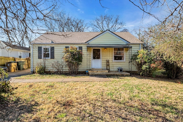 bungalow with a front yard