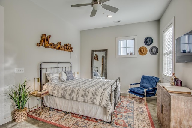 bedroom featuring ceiling fan and carpet flooring