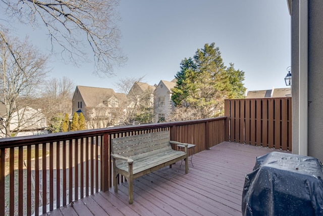 wooden deck with area for grilling