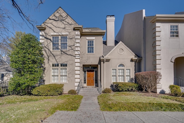 view of front of home with a front yard