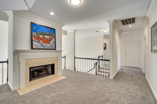 interior space featuring crown molding and carpet floors