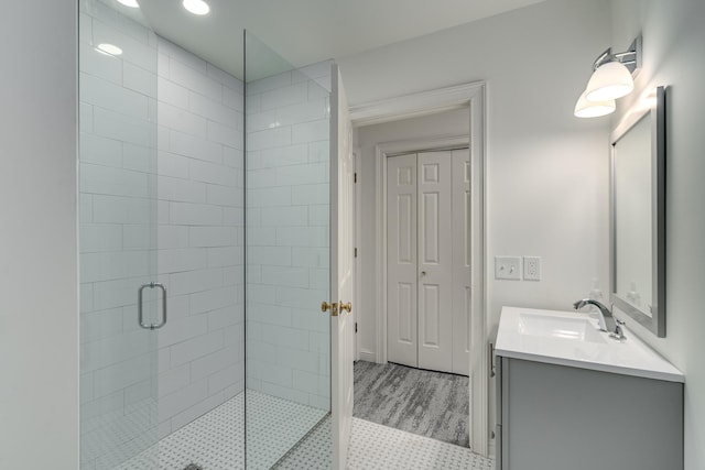 bathroom with vanity and an enclosed shower