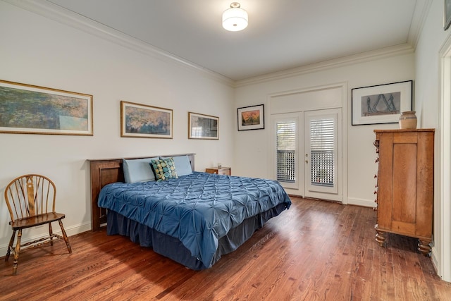 bedroom with ornamental molding, dark hardwood / wood-style floors, access to outside, and french doors