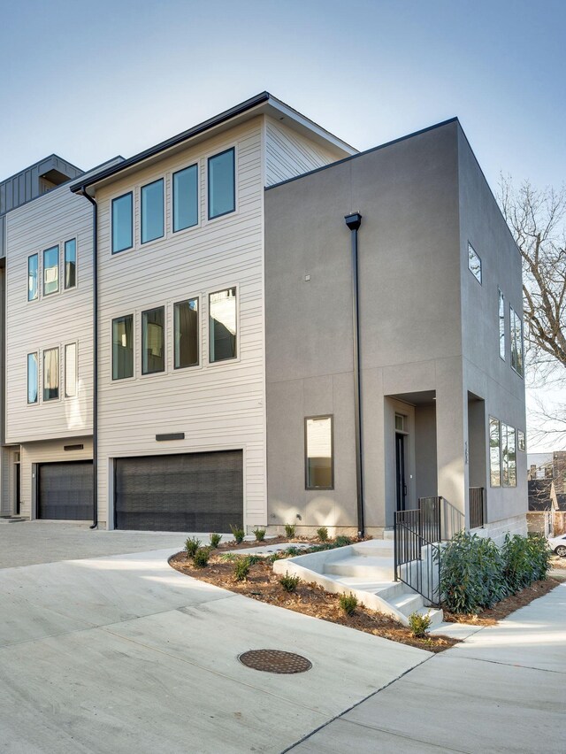 modern home featuring a garage