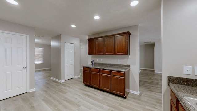 kitchen featuring sink and light hardwood / wood-style floors