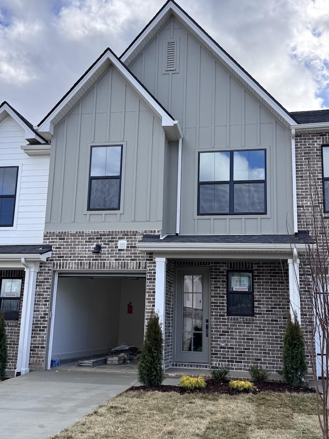 view of front of property with a garage