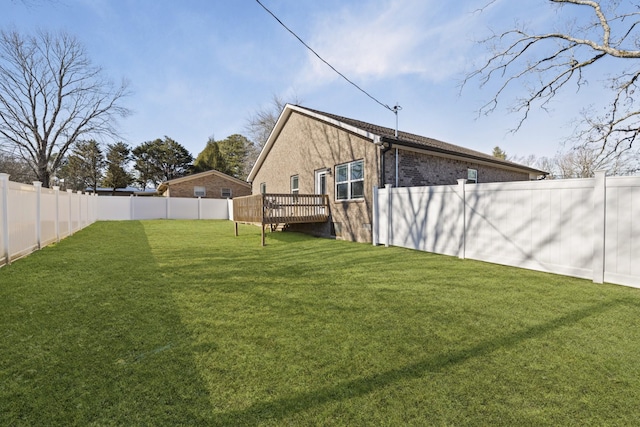 view of yard featuring a deck