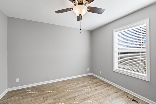 unfurnished room featuring ceiling fan and light hardwood / wood-style flooring