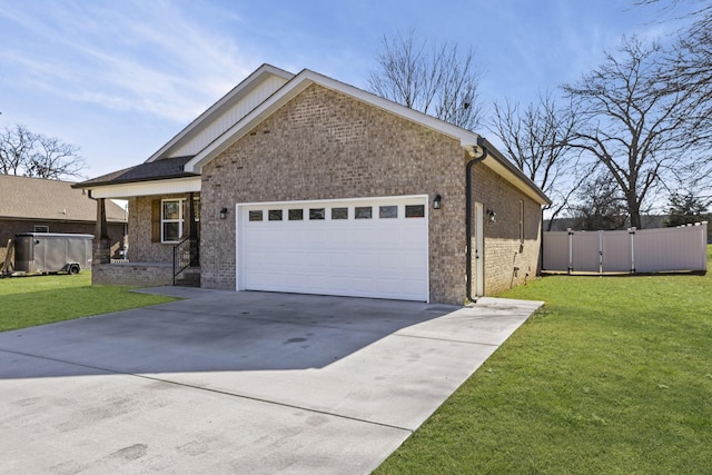 view of front facade with a garage and a front yard