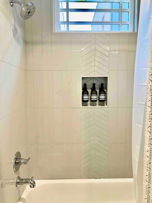 bathroom with shower / tub combo