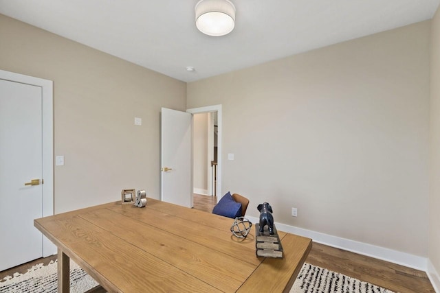 office with wood-type flooring