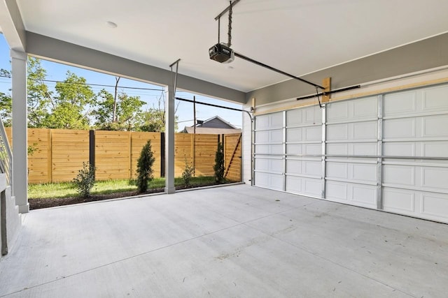 garage featuring a garage door opener