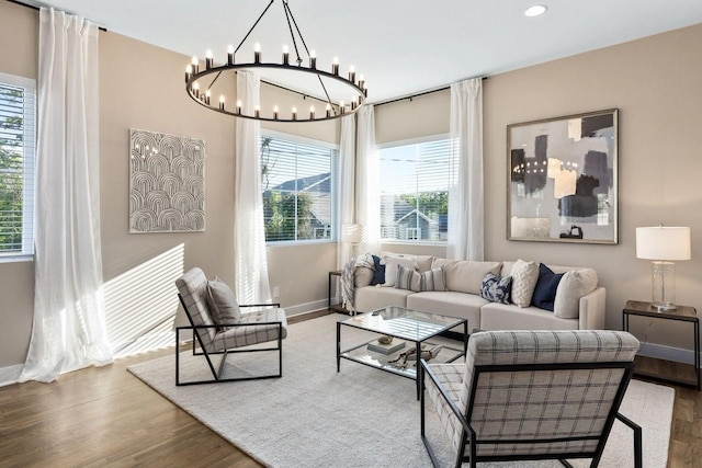 living room featuring hardwood / wood-style flooring and a healthy amount of sunlight