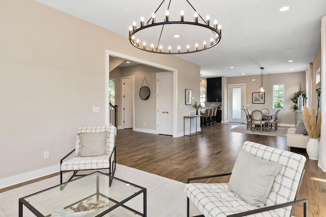 living room with dark hardwood / wood-style flooring