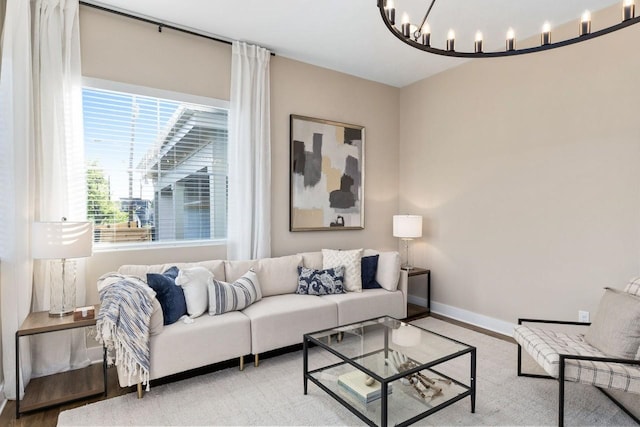 living room with a notable chandelier