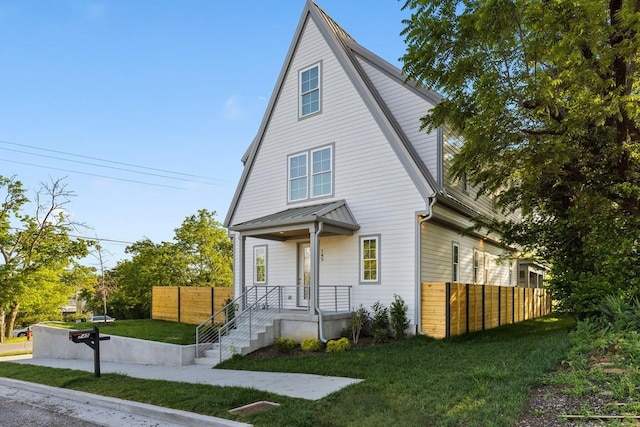 view of front of property with a front lawn