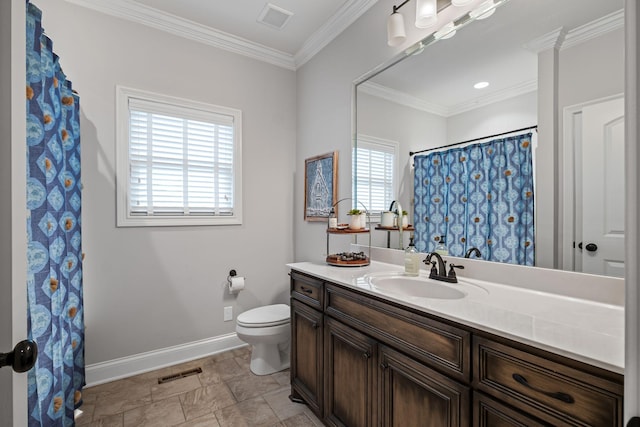 bathroom featuring vanity, crown molding, and toilet