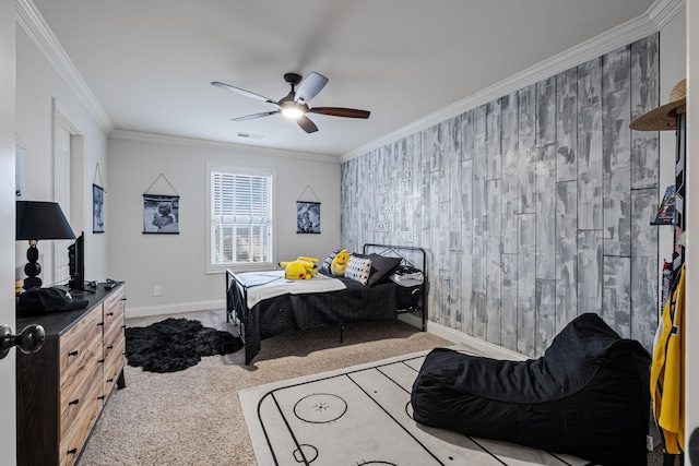 bedroom featuring crown molding, light carpet, and ceiling fan