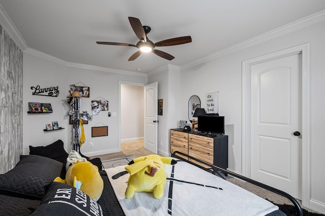 carpeted bedroom featuring crown molding and ceiling fan