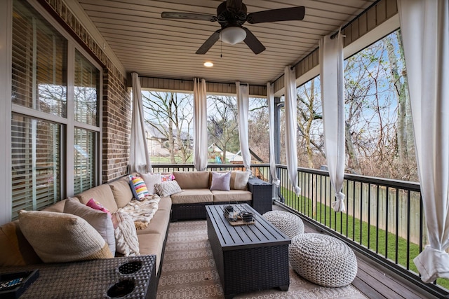 sunroom / solarium with ceiling fan