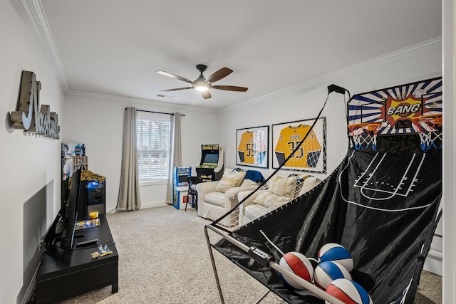 interior space featuring ornamental molding, carpet floors, and ceiling fan