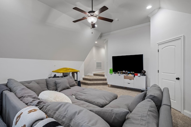 carpeted living room featuring lofted ceiling, ornamental molding, and ceiling fan