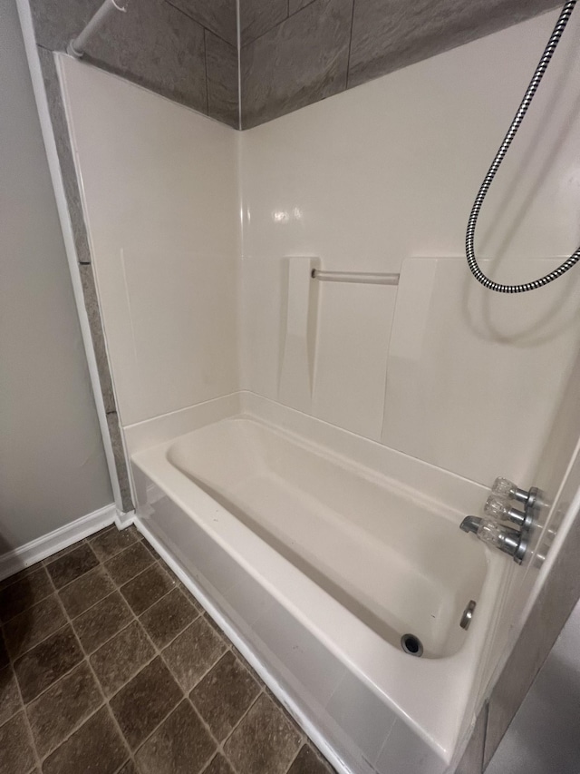 bathroom with shower / bathtub combination