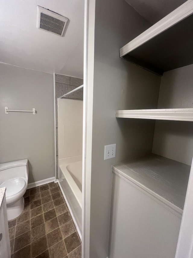 bathroom featuring toilet