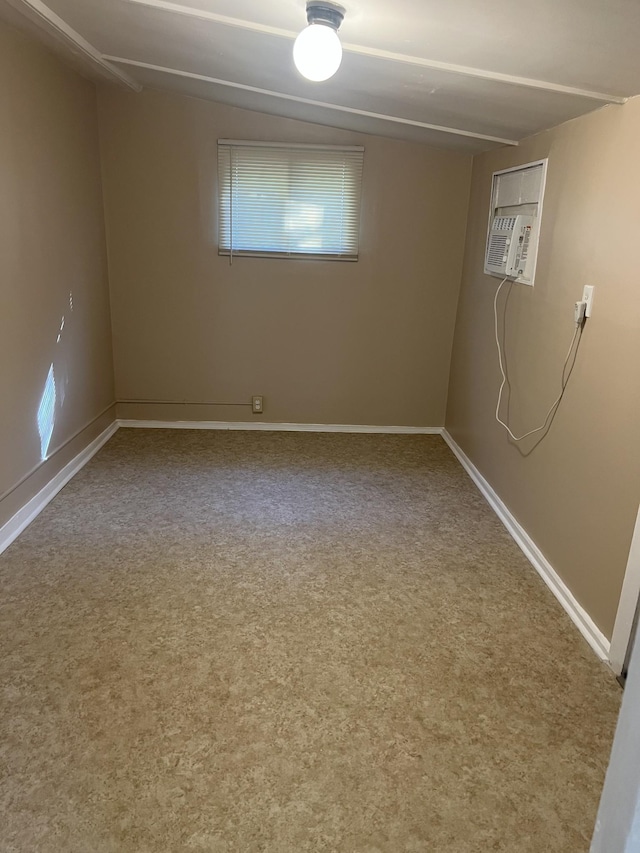 carpeted spare room with cooling unit