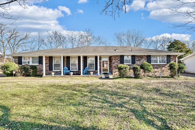 ranch-style home with a porch and a front lawn