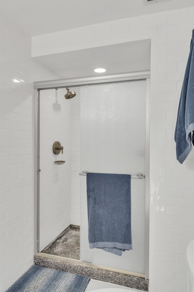 bathroom with an enclosed shower