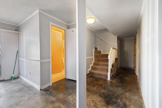 stairway with concrete flooring, crown molding, and a textured ceiling