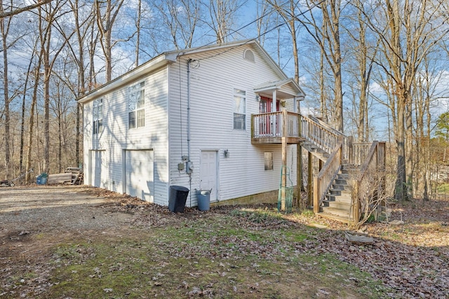 view of side of home with a garage