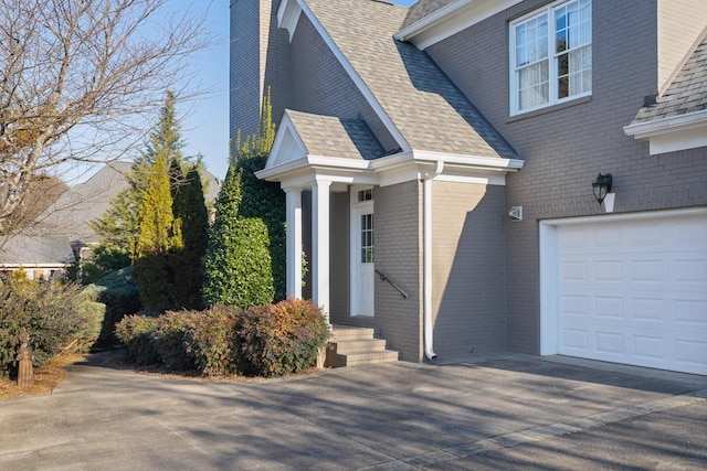 view of property exterior with a garage