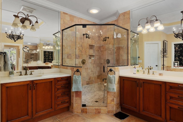 bathroom with crown molding, vanity, an enclosed shower, tile patterned floors, and a chandelier