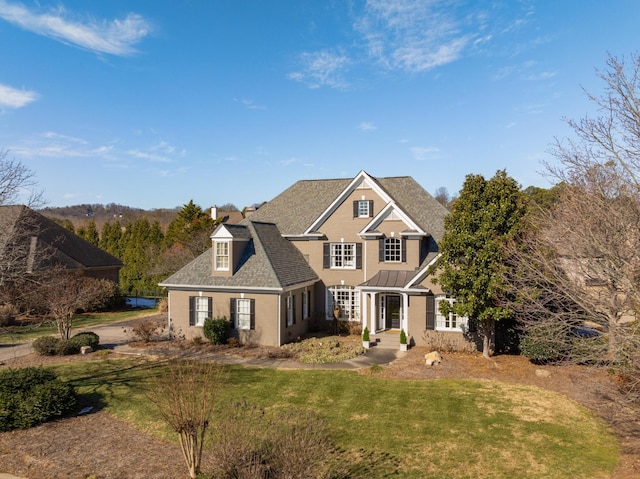 view of front of home featuring a front yard