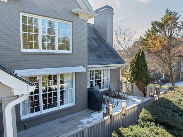 wooden deck featuring area for grilling