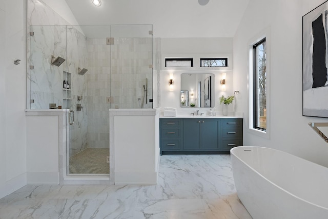 bathroom with independent shower and bath, vanity, and vaulted ceiling