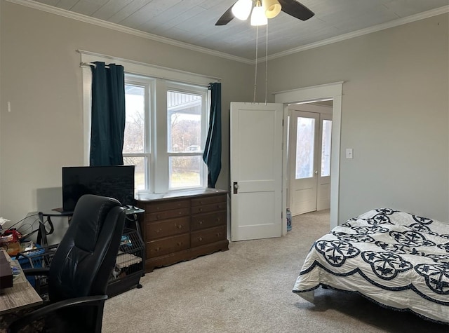 bedroom featuring ceiling fan, ornamental molding, and light carpet