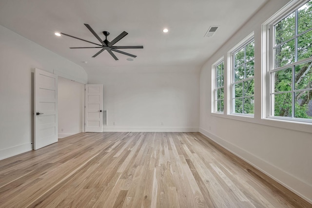 unfurnished room featuring light hardwood / wood-style floors and ceiling fan