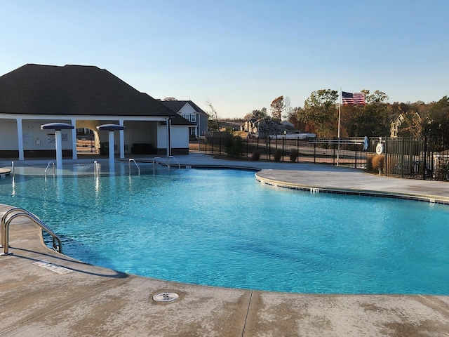 view of swimming pool with a patio