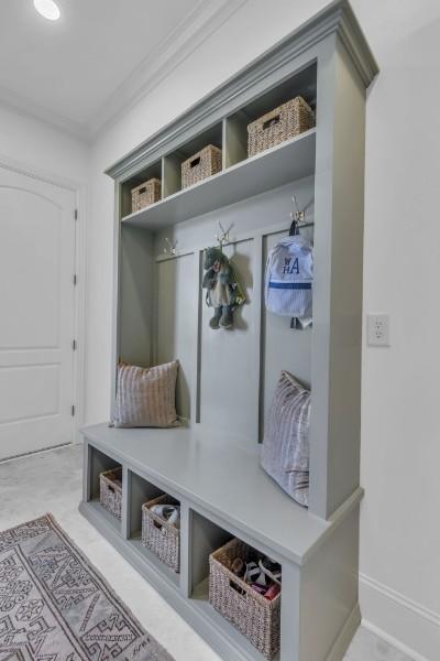 mudroom with crown molding