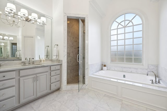 bathroom with shower with separate bathtub and vanity