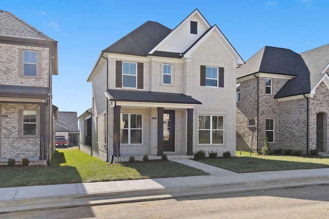 view of front of property featuring a front yard