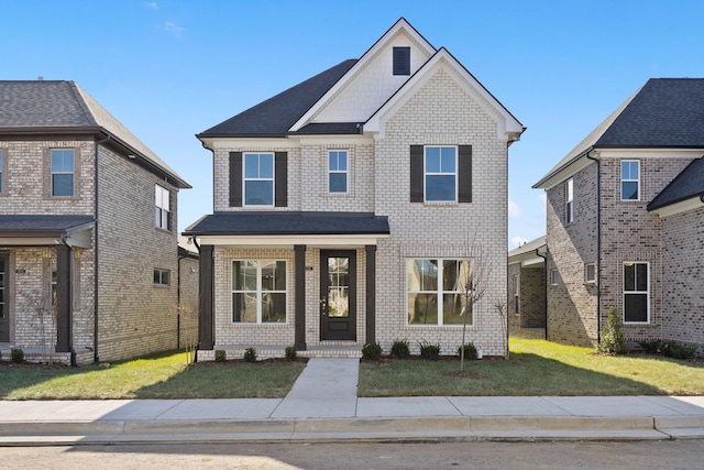 view of front of home with a front lawn