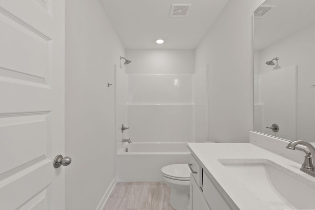 full bathroom featuring vanity, shower / bathtub combination, and toilet