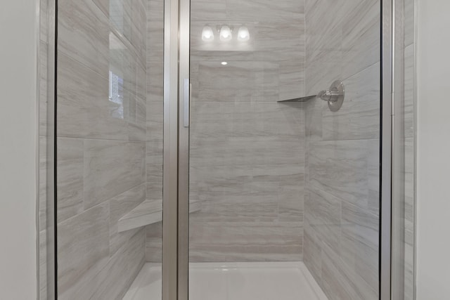 bathroom with an enclosed shower