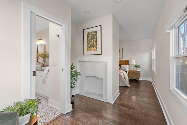 hall featuring dark hardwood / wood-style floors